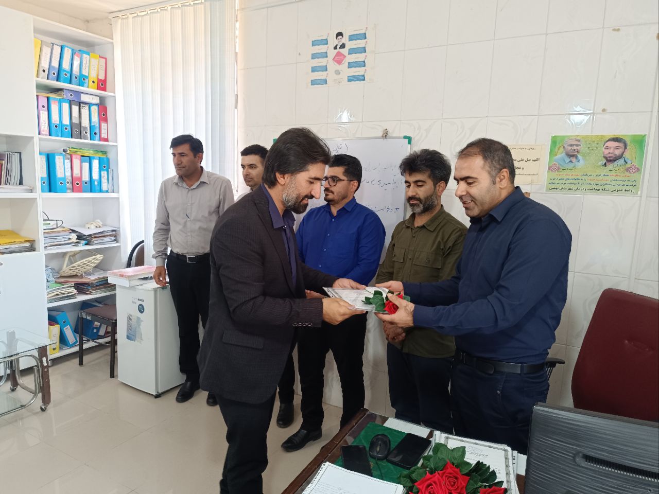 تجلیل از بهورزان در شهرستان بهمئی